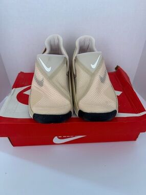 Nike Beige Slip-On Mesh Sneakers with White Swoosh